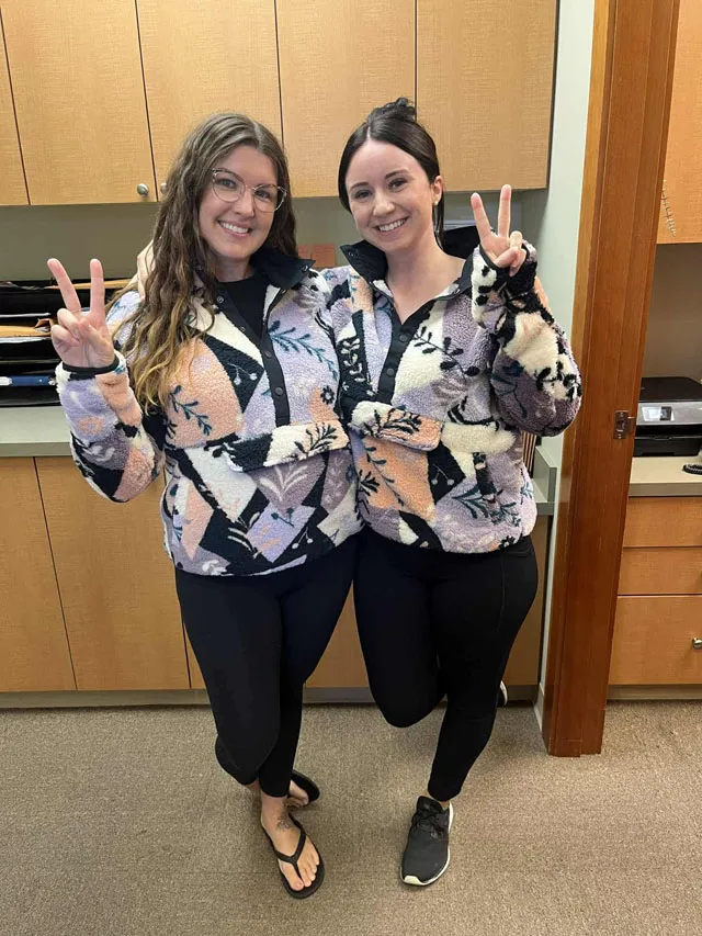 Colleagues dressed alike